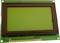 A green LCD display with black borders on an electronic circuit board.