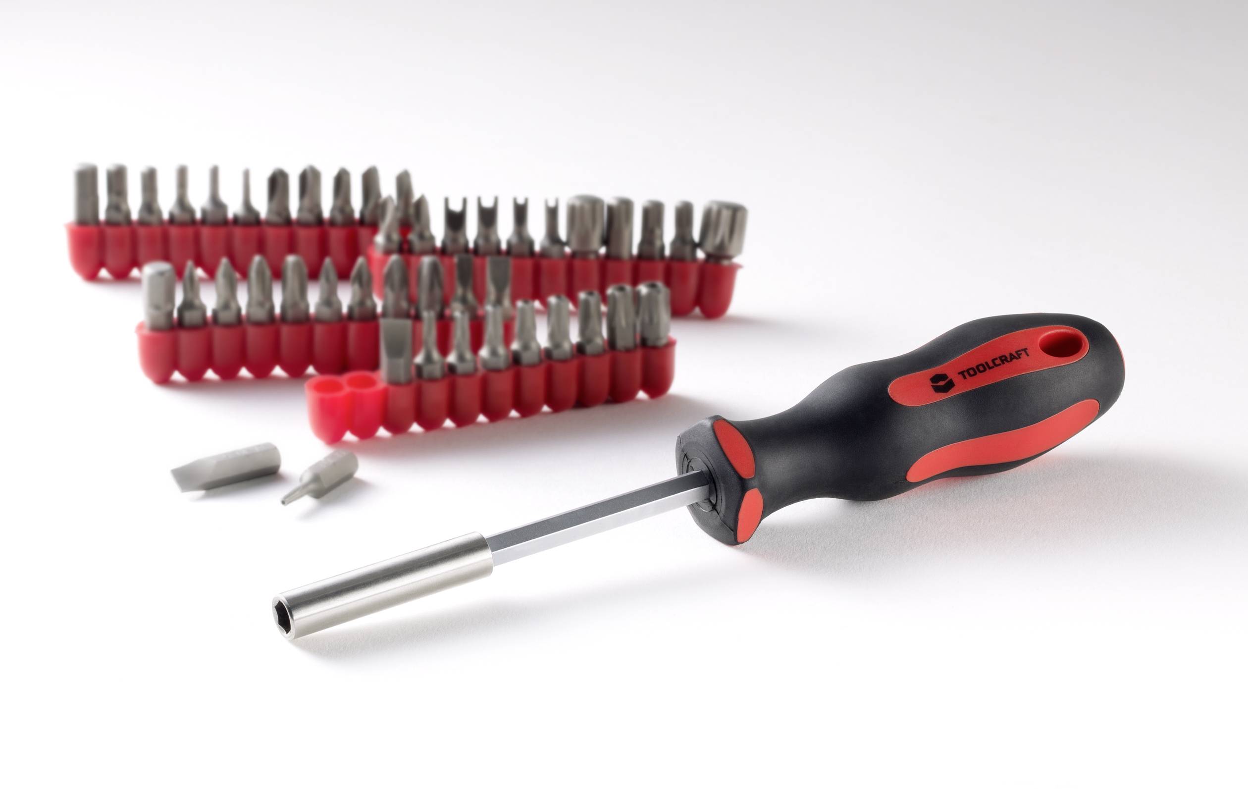 Screwdriver with bit set and red handle, alongside two bit holders with various bits. Ideal for versatile screw-related tasks.