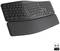 Black ergonomic keyboard with a curved design and separate, padded wrist rest. Includes a USB dongle.
