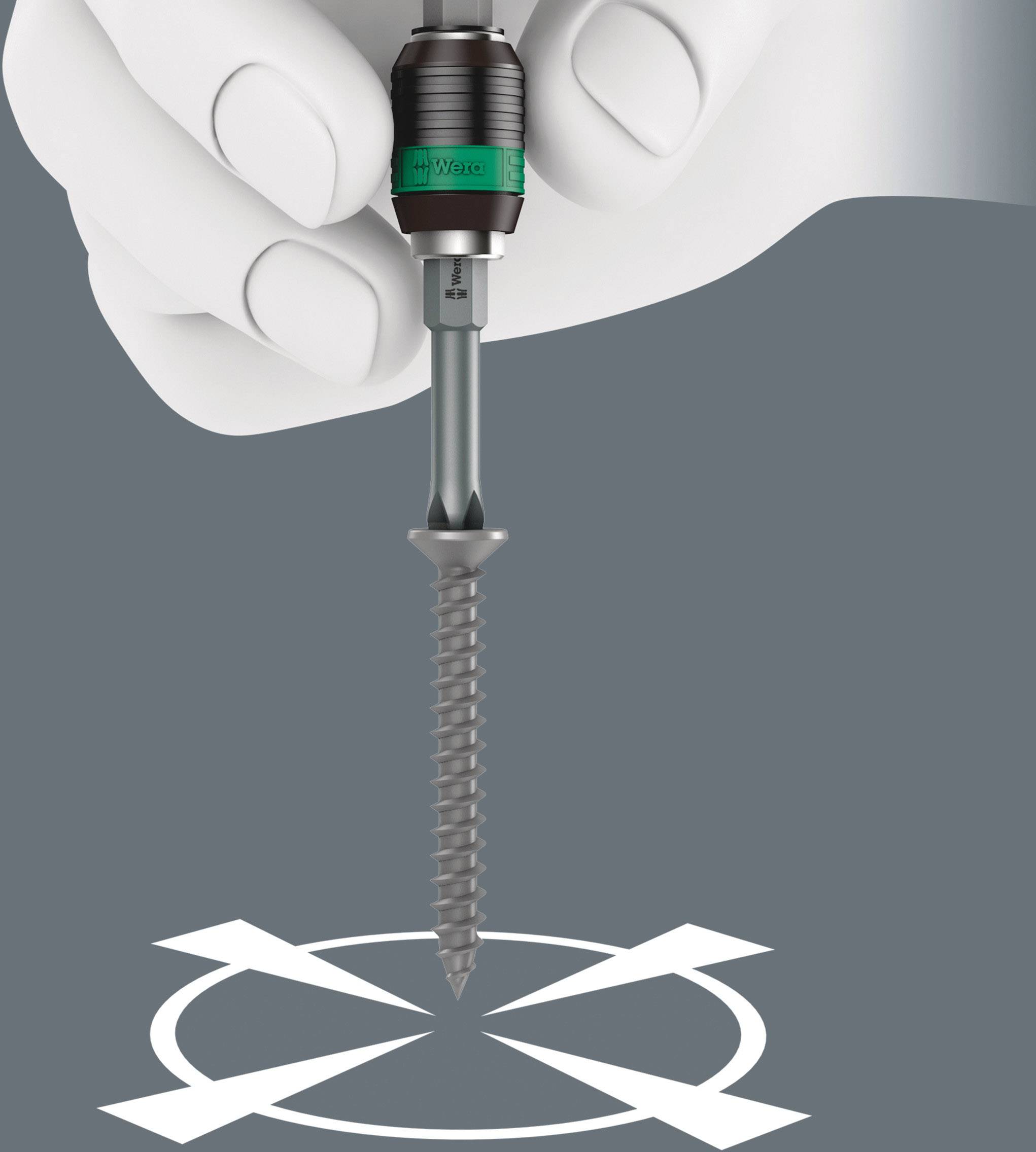 A hand holds a screwdriver driving a screw into a target pattern on a grey background.