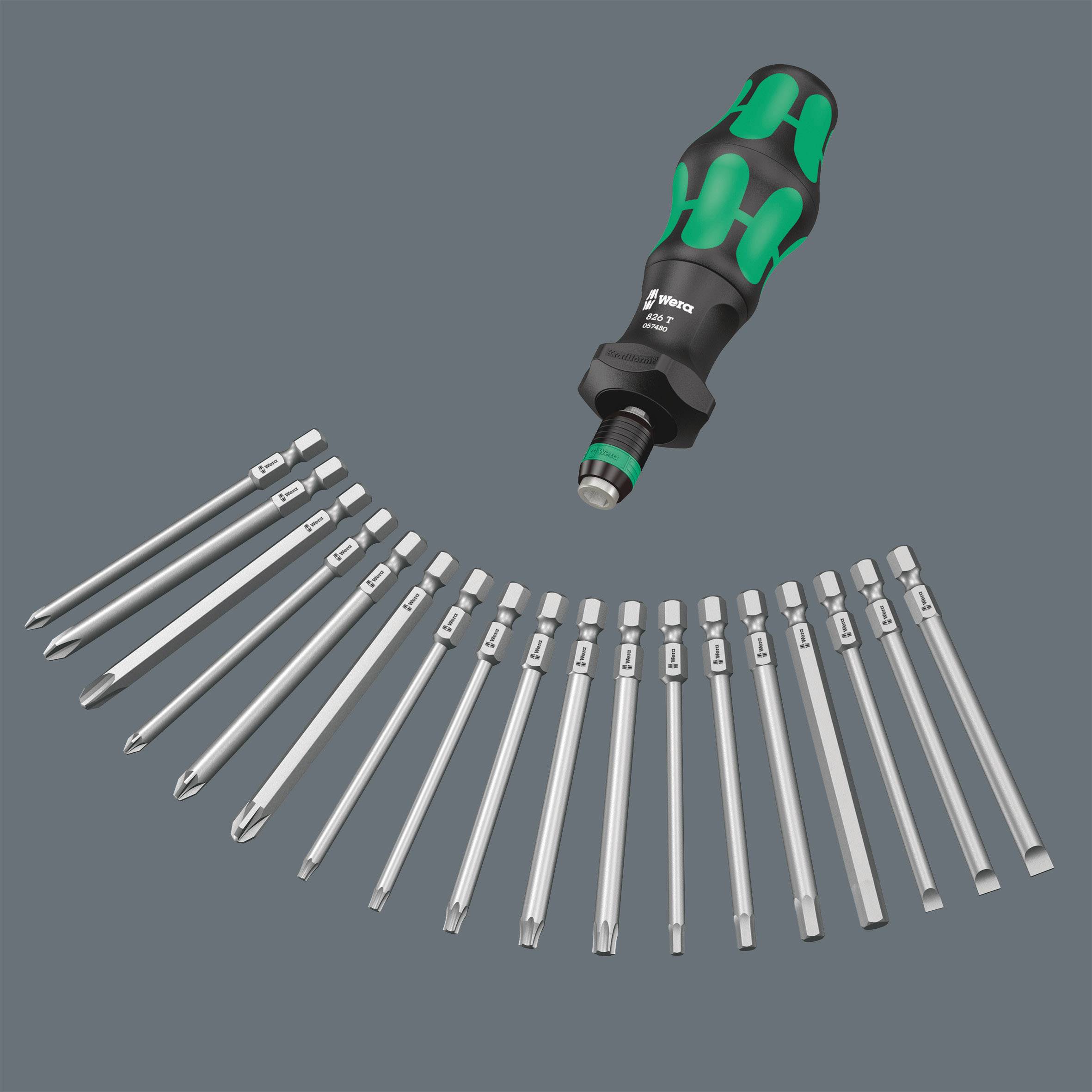 A screwdriver with a green and black handle and twenty interchangeable bits in various shapes against a grey background.