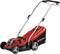 A red lawnmower with grey wheels and a black handle. Branded 'Einhell'. The lawnmower is cordless.