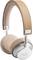 Beige headphones with silver accents and the 'hör' logo on one ear cup. Design combines leather and metal.