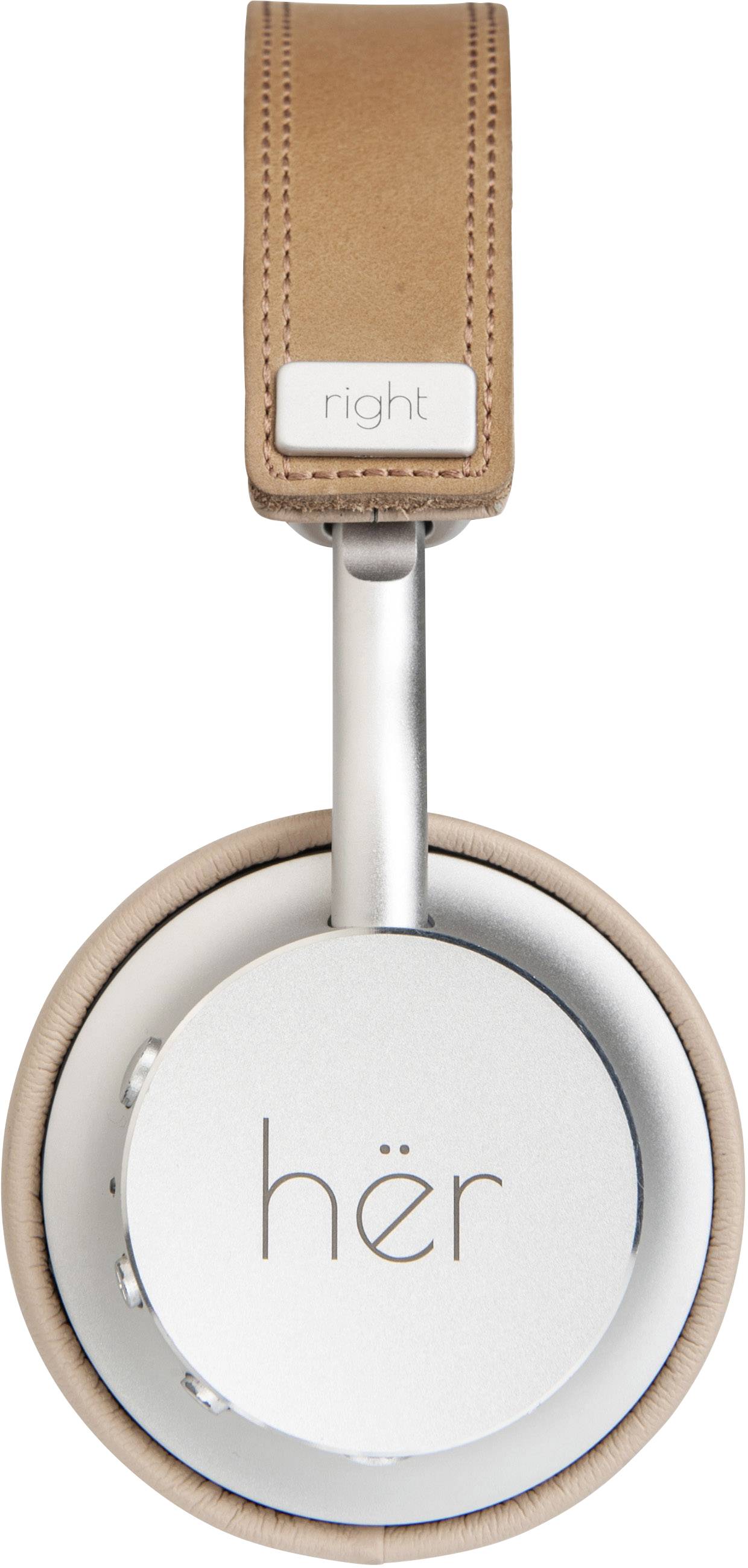 Headphones with silver ear cups and a brown leather headband, labelled 'hër'.
