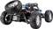 A remote-controlled off-road vehicle with large, chunky tyres, a robust chassis, and visible suspension.