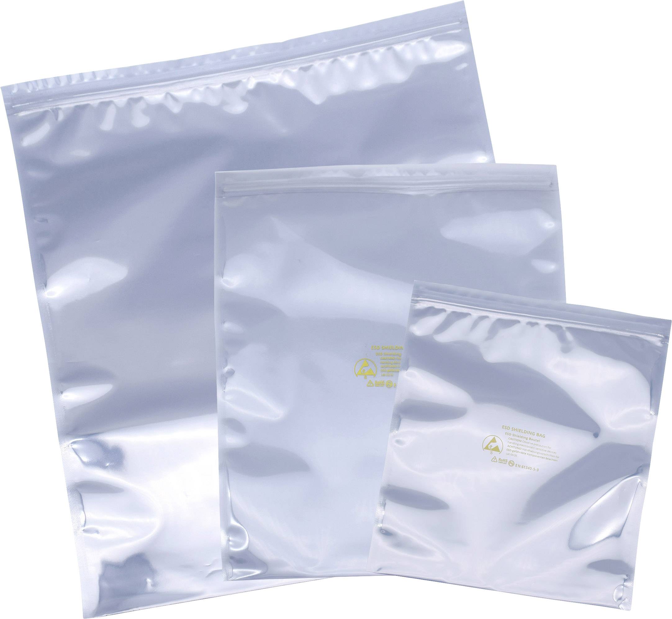 Three silver anti-static bags in various sizes, stacked on top of each other. They reflect light and have safety markings.