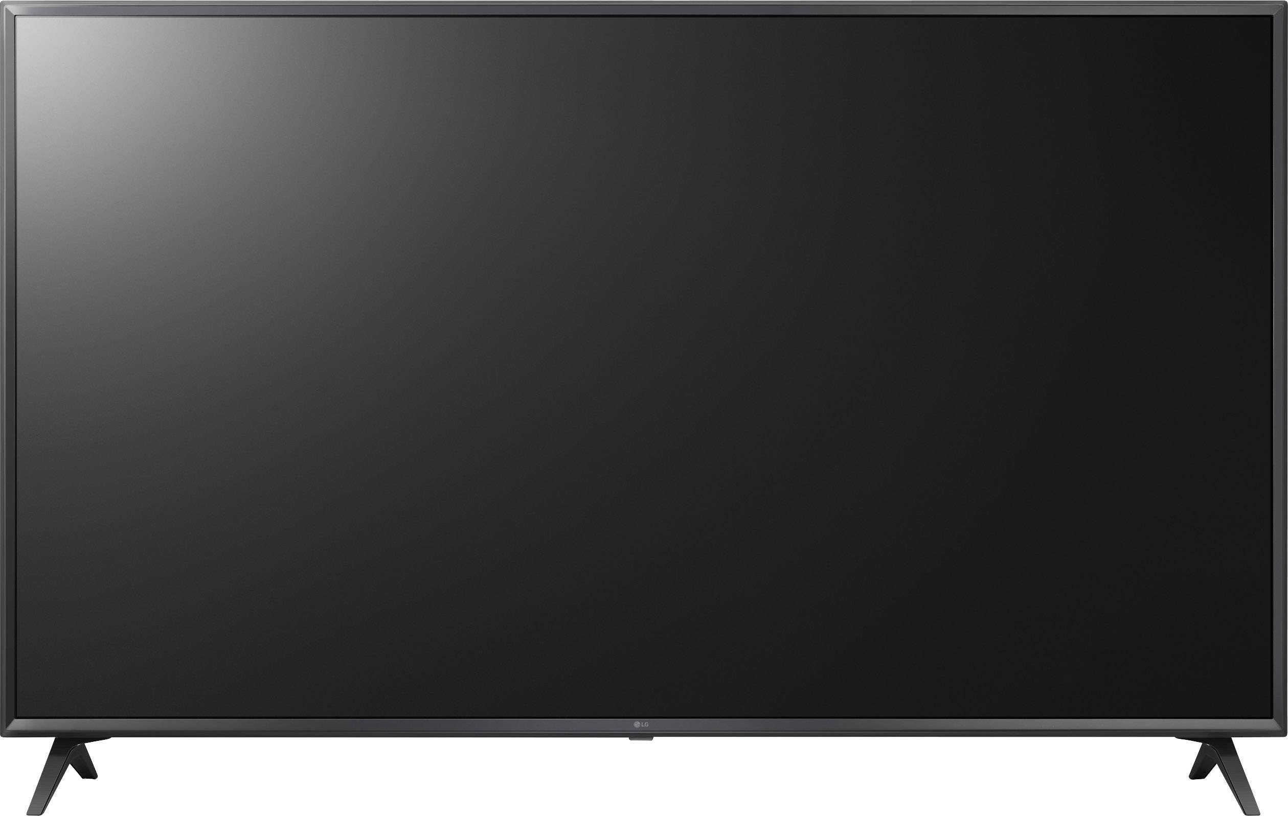 A large, black flatscreen television with a slim bezel sits switched off on a stand.