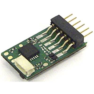 Microchip with multiple connections and electronic components on a green circuit board. Key component for electronic devices.