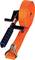 An orange ratchet strap, wound with a black handle and blue-black grip, lies on a white surface.