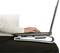 A person is typing on a laptop, which is positioned on an ergonomic laptop stand resting on their lap.