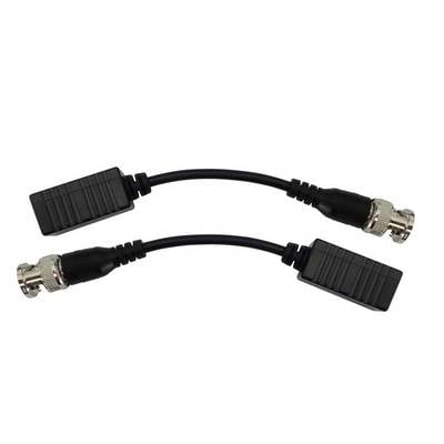 Two short, black adapter cables with BNC connectors and rectangular plastic housings, used for transmitting video signals.