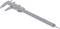 Metal calliper with scale for precise measurement, lying on white background. Suitable for technical or engineering applications.