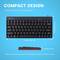 Compact black keyboard on a blue background, measuring 29.1 x 13.8 cm. Indication of ergonomic design.