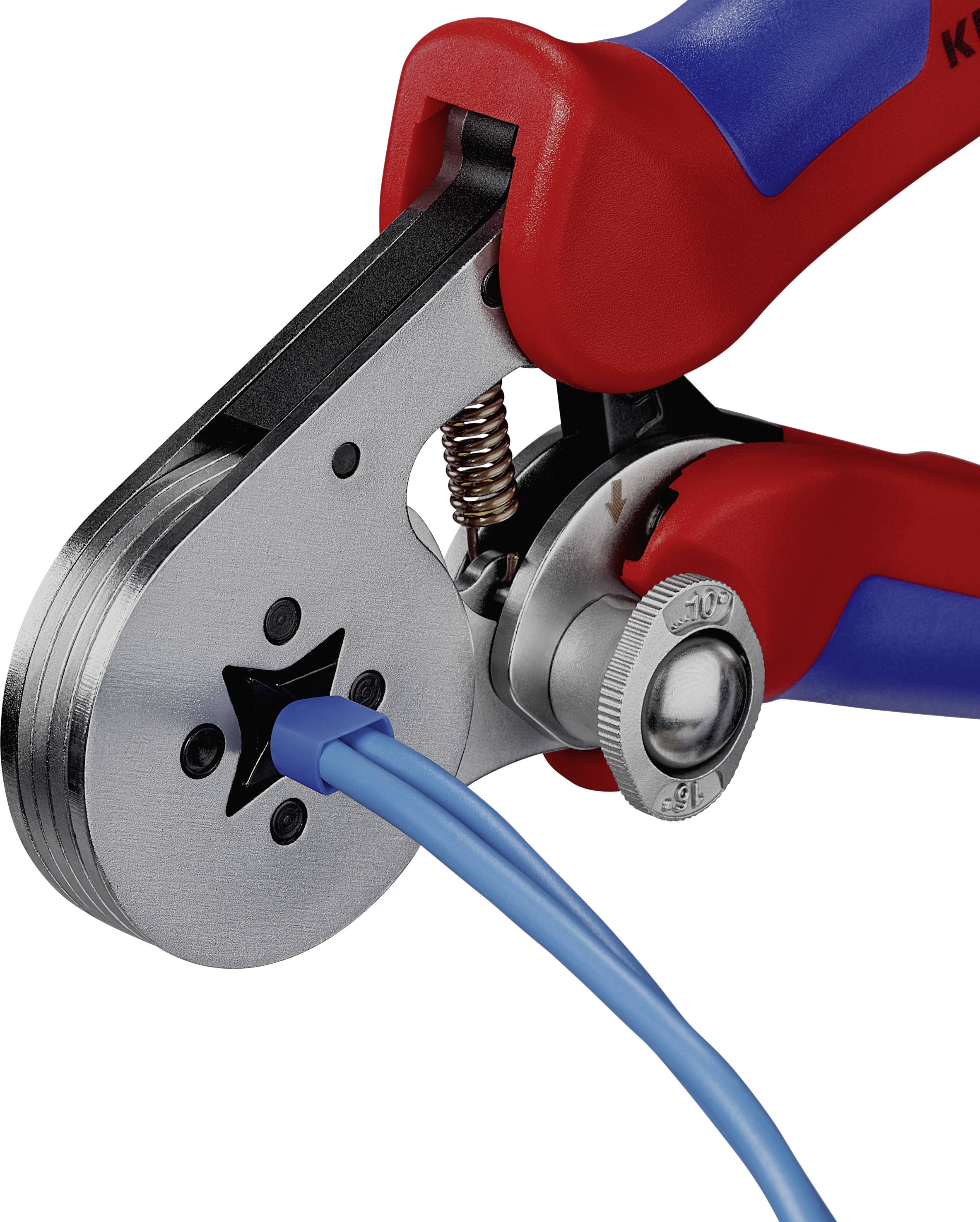 A pair of pliers crimped a blue cable connector. The pliers have red and blue handles, suitable for precise work.