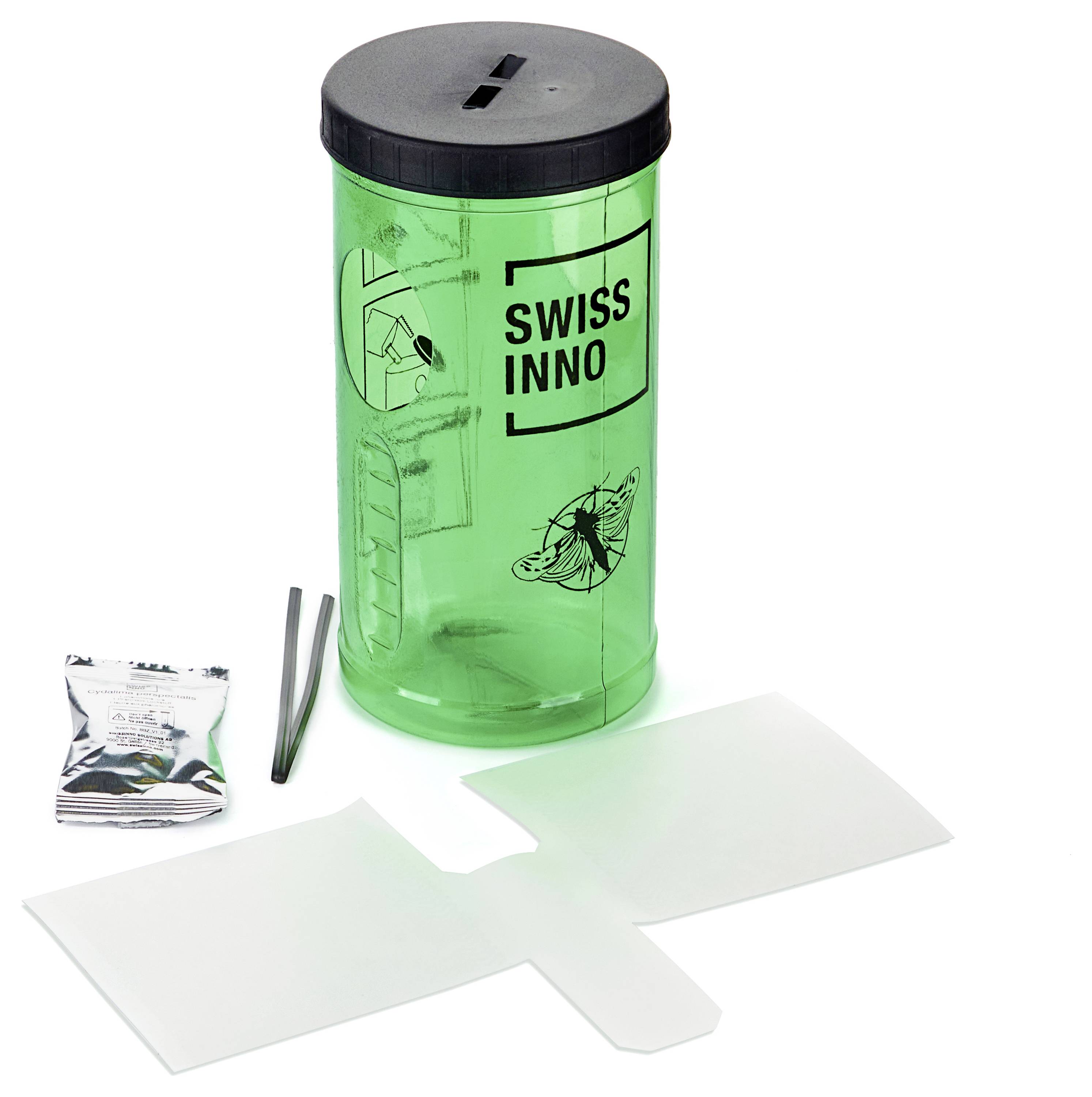 Green wasp trap with black lid, labeled 'SWISS INNO', next to included bait packet and instruction sheet. Designed to capture wasps.
