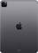 Back of a dark grey tablet with the Apple logo and camera in the top left corner.
