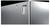 Close-up of a gleaming metallic surface with sharp edges and a small rectangular indentation, against a black background.
