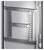 Metal frame with a square mesh pattern, mounted on a white wall with silver-coloured screws.