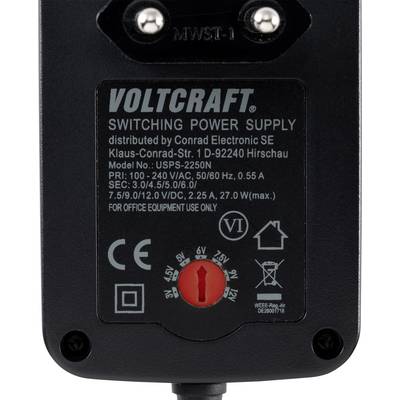 A black power supply from Voltcraft with model number USPS-2250N. It has multiple output voltages and is designed for office use.