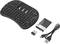 Compact wireless mini keyboard with integrated touchpad, USB dongle, and included charging cable. Ideal for smart TVs and PCs.