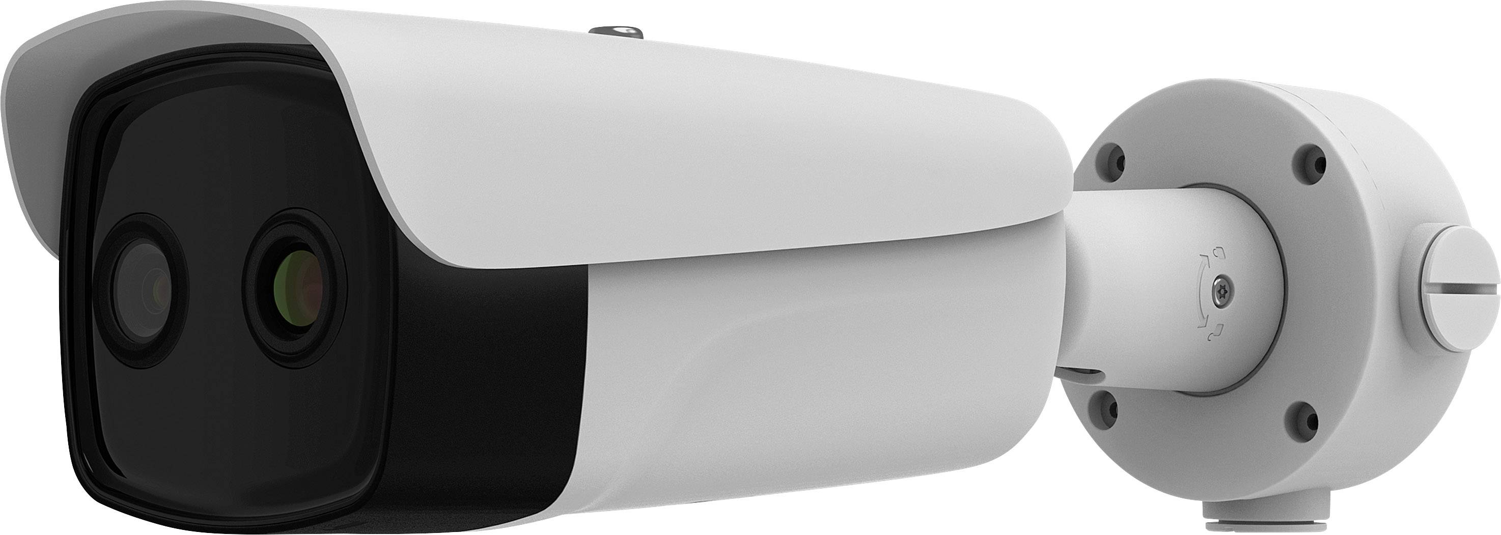 A surveillance camera with a weatherproof housing is mounted on a wall bracket. The camera has two lenses.