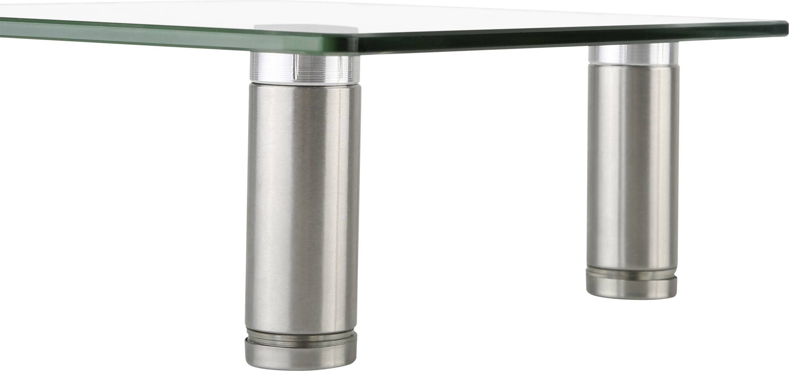 Two silver metal table legs with a transparent glass top.