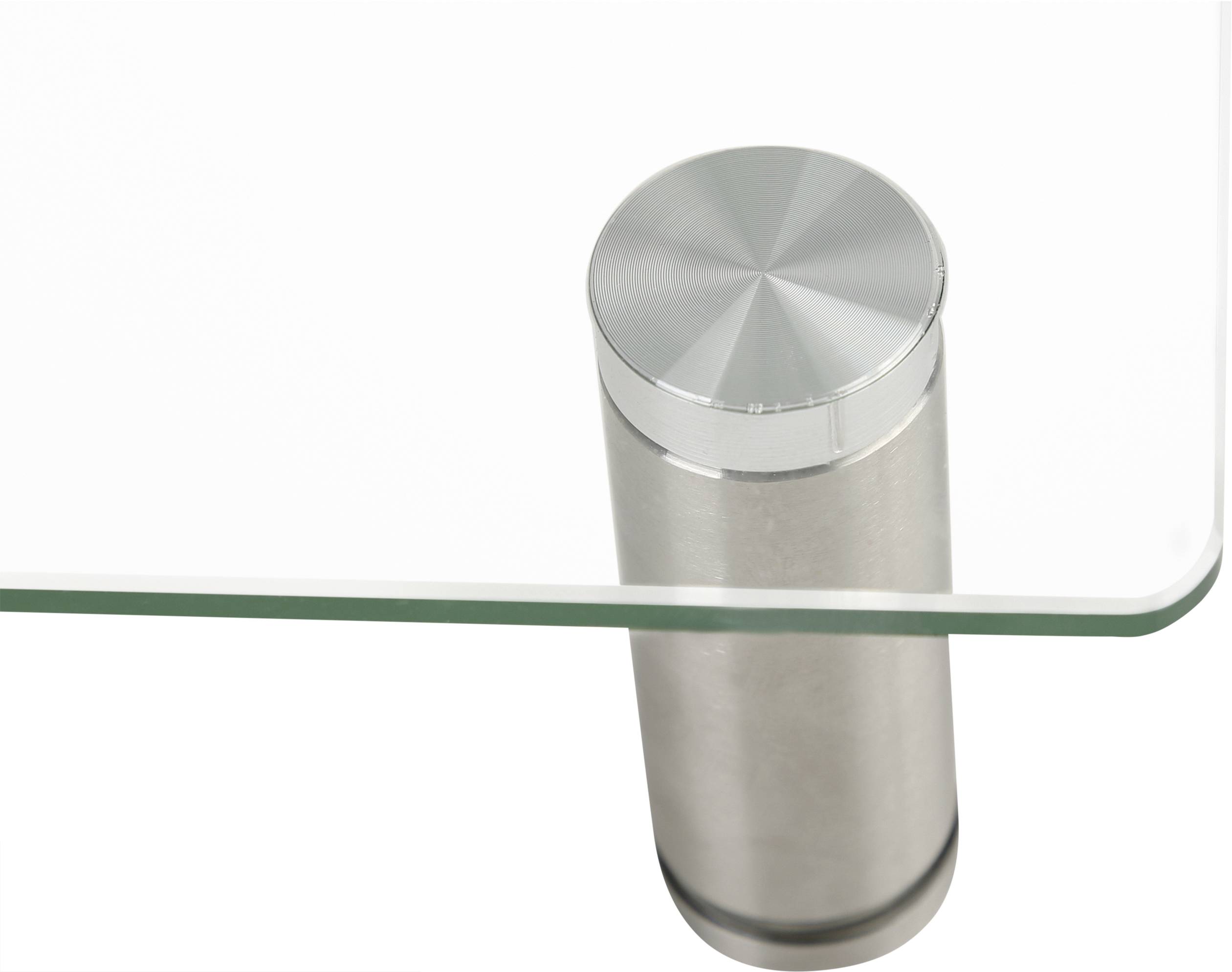 Edge detail of a glass table with a round metal leg.