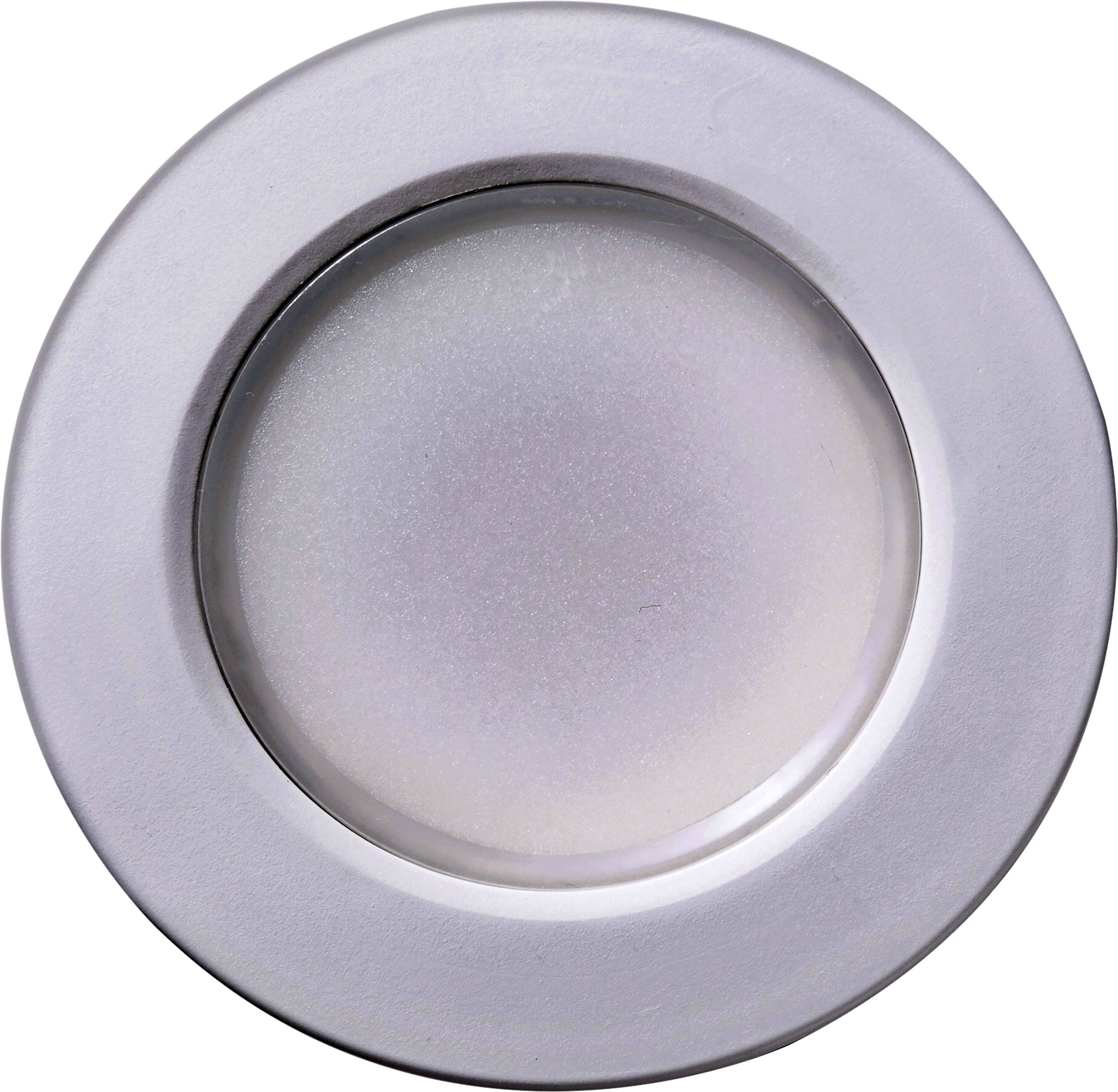 A silver round button or lid with a smooth surface, centred in the image.