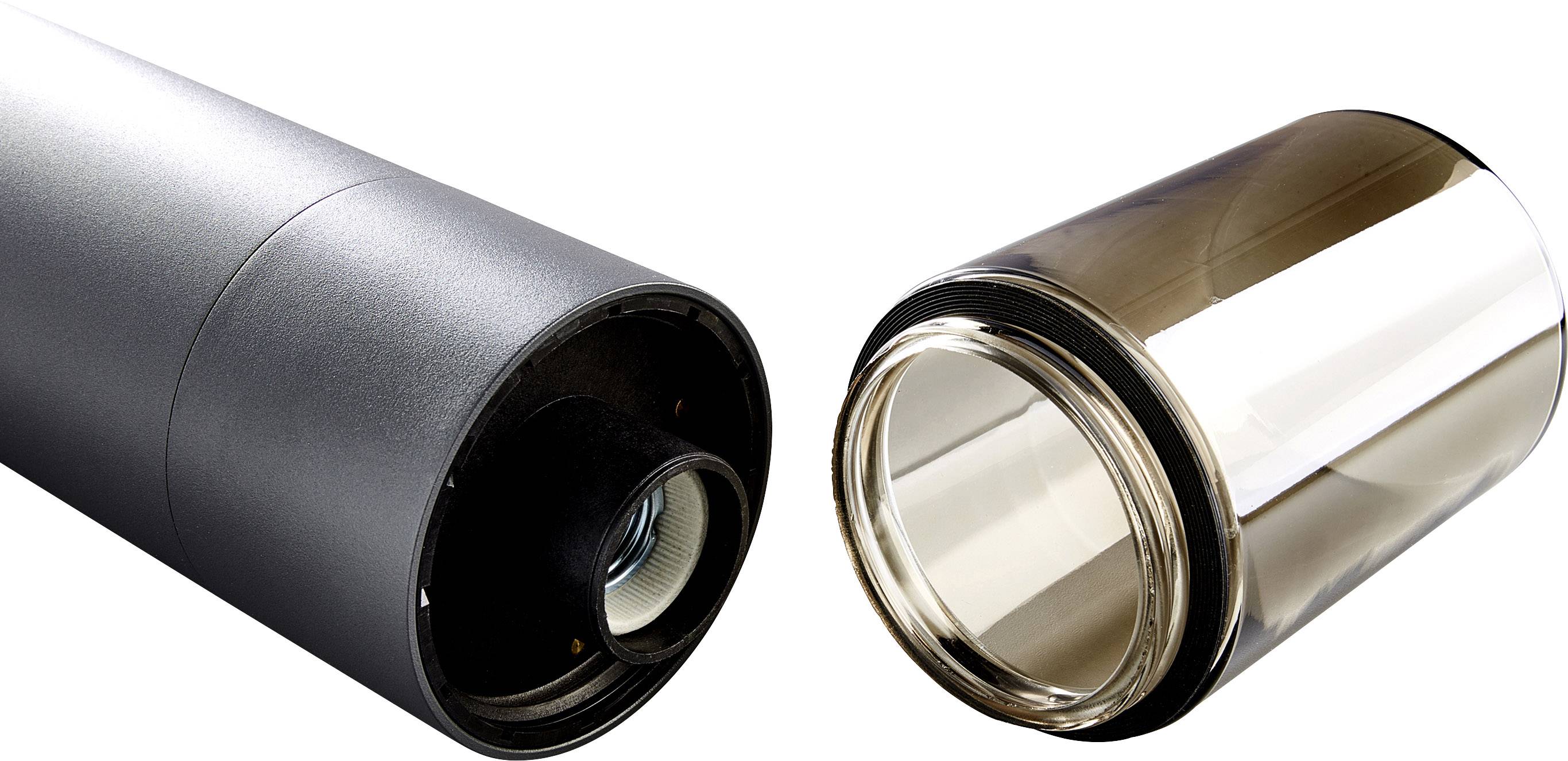 A black, cylindrical container with a removable lid that reveals its interior.
