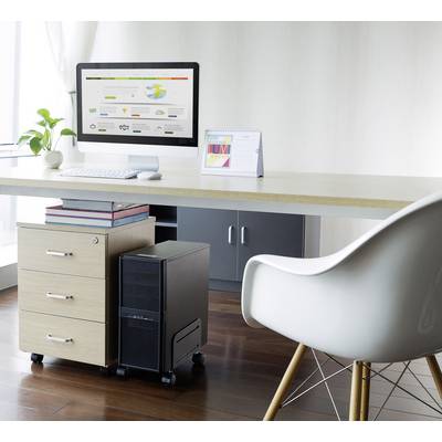 Modern workspace with a computer on a desk, office chair, plant and calendar. Bright, minimalist interior.