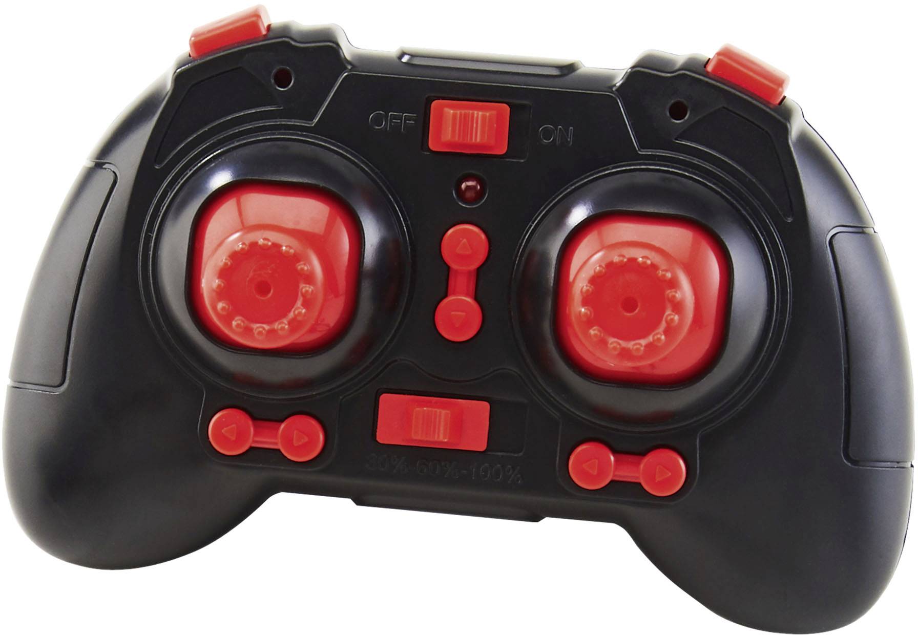 Black and red controller with two joysticks and multiple buttons, switched on, likely for a remote-controlled toy.