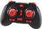 Black and red controller with two joysticks and multiple buttons, switched on, likely for a remote-controlled toy.