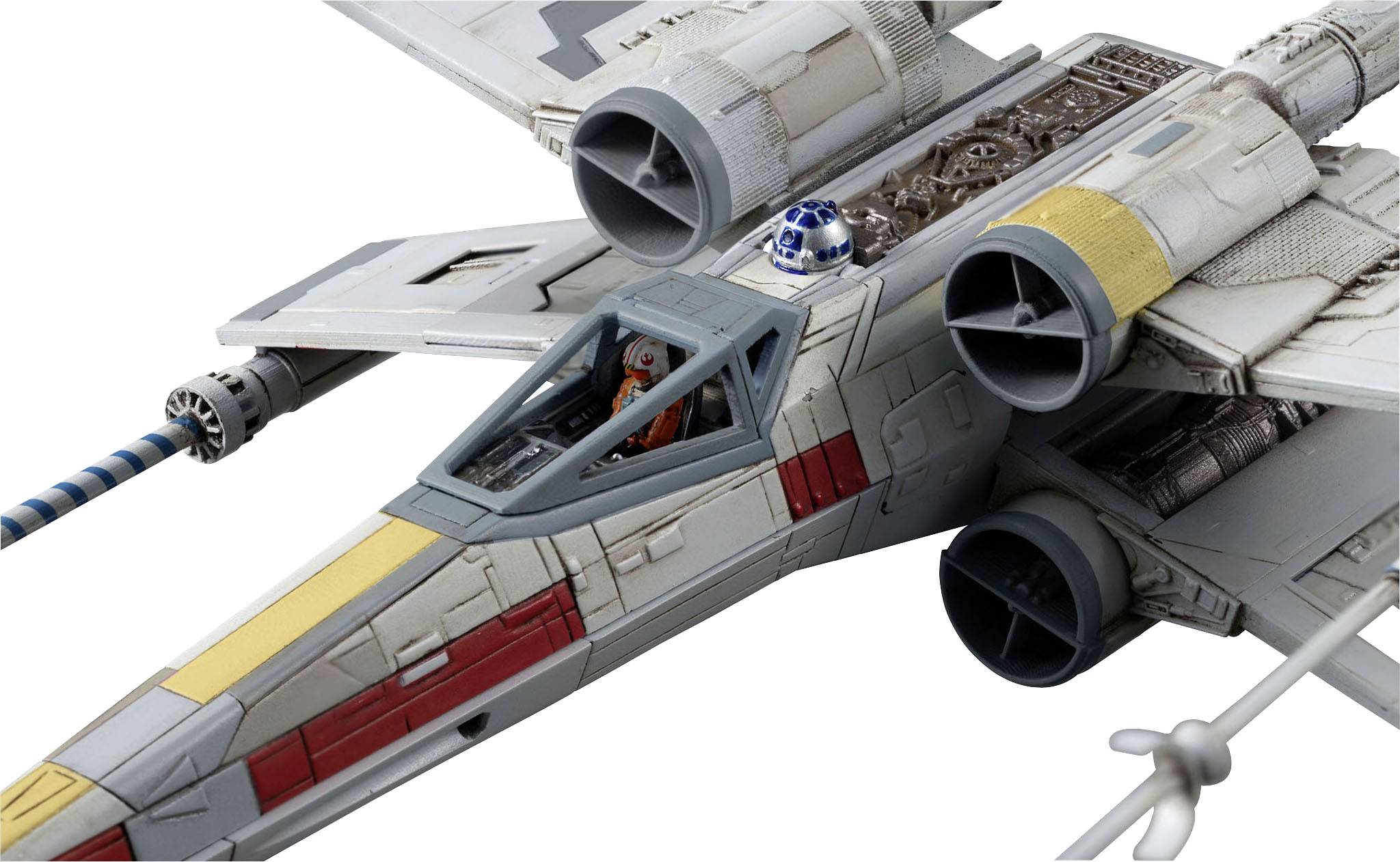 A spacecraft model with a distinctive design, cockpit, and a blue robot in the rear section of the ship.