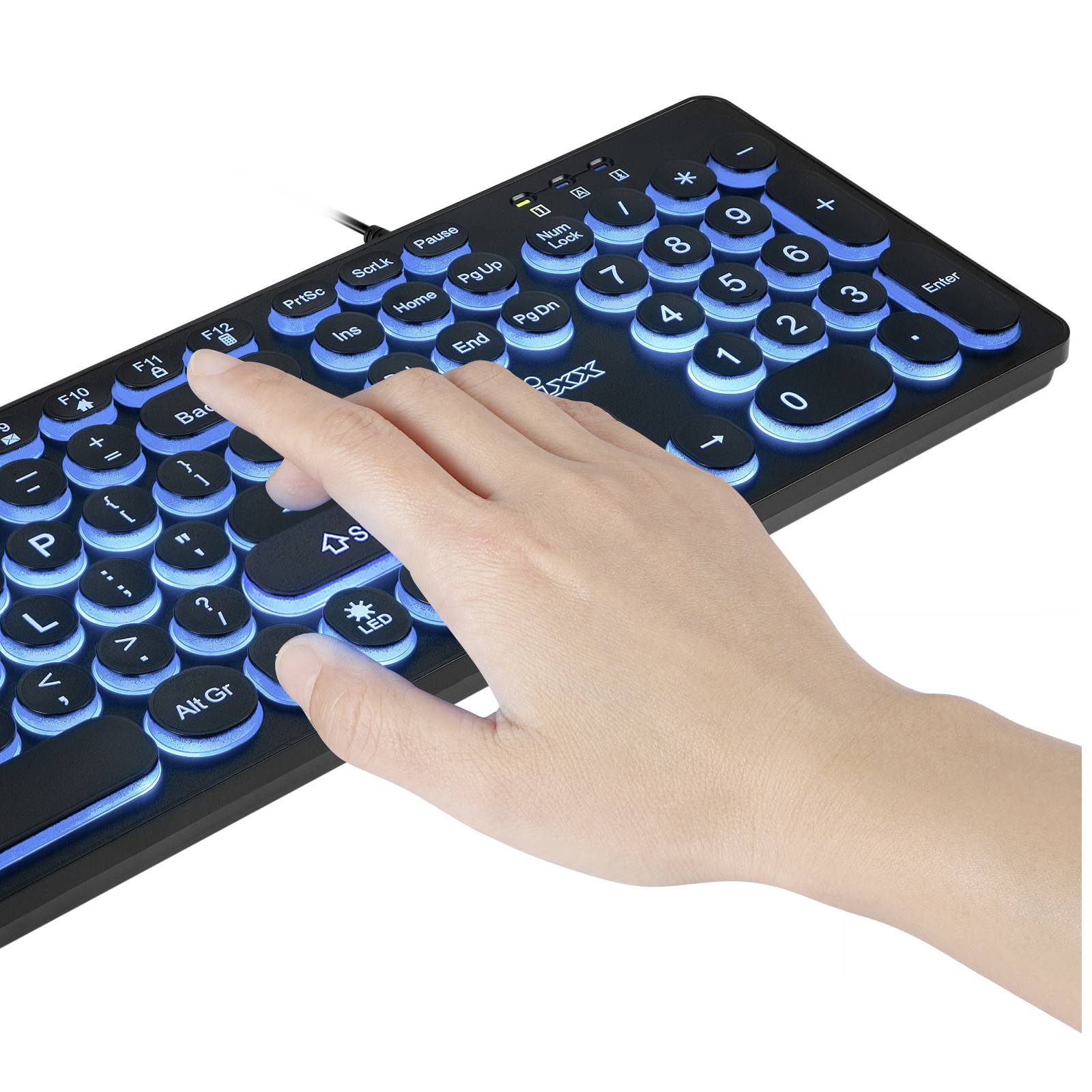 A hand is tapping on an illuminated keyboard with blue keys.