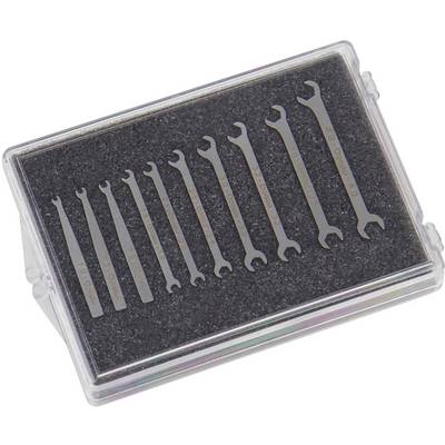 'Small set of precision mechanical spanners in various sizes on black foam inside a transparent box.'