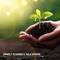 A hand holds a small plant in soil. Underneath the text reads 'Protect the Environment & Save Money'. Symbolises sustainability.