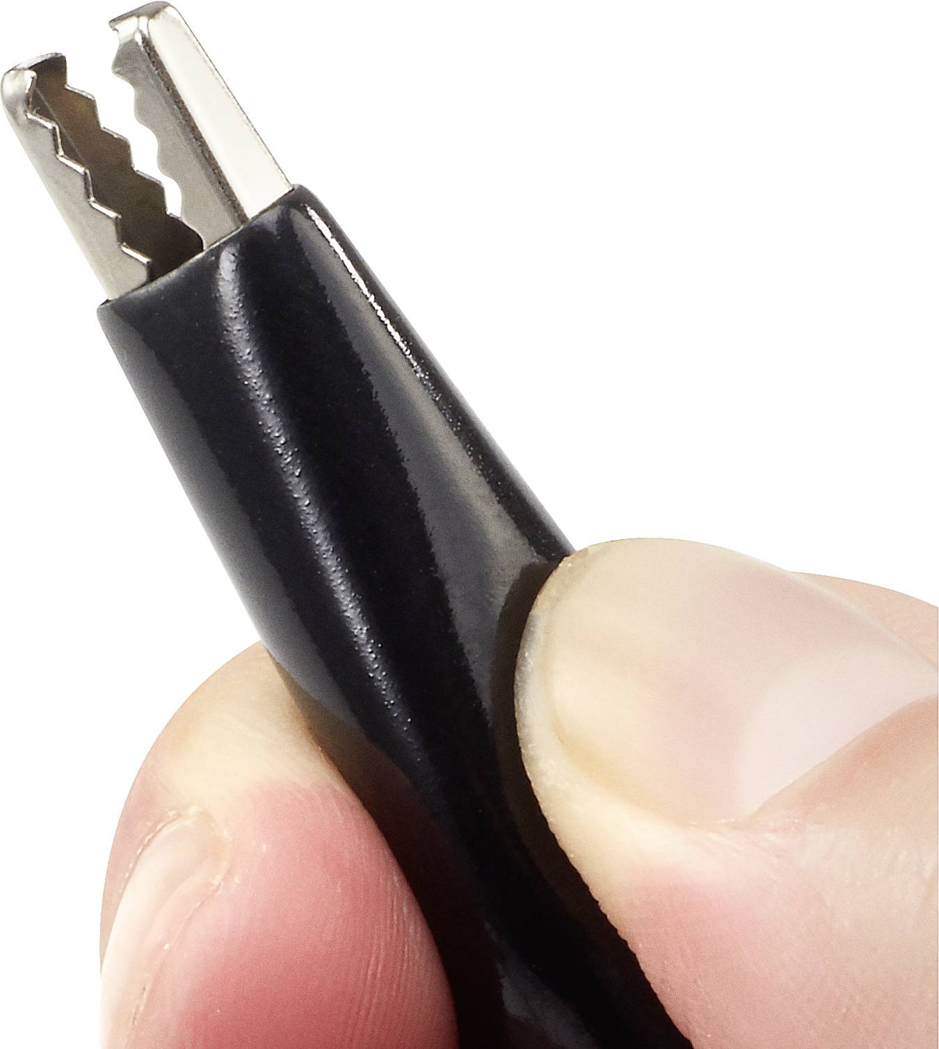 Close-up of a black crocodile clip connector, held between thumb and forefinger.