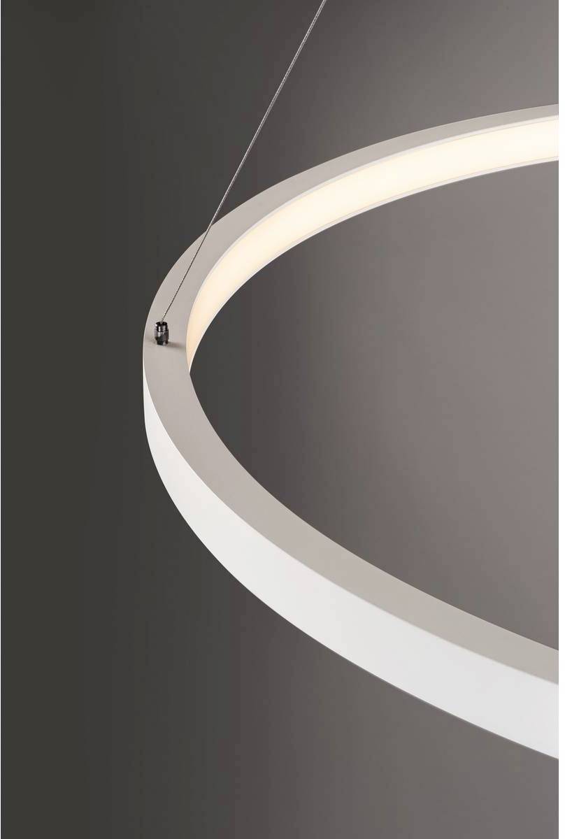 Modern hanging ring light in an elegant, minimalist design, evenly illuminating the space and creating a stylish atmosphere.