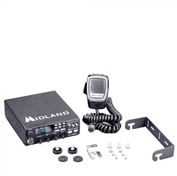 CB radio with microphone, cable, mounting kit and screws. Branded name 'Midland' marked on the device and microphone.