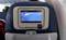 A screen in an aircraft seat shows a flying aeroplane.
