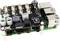 A Raspberry Pi expansion board with multiple ports and electronic components, suitable for various technical applications.
