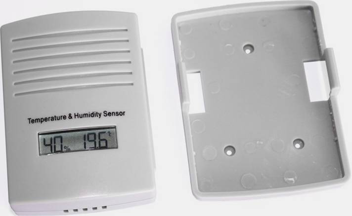 Temperature and Humidity Sensor with LCD Display. Showing 40% relative humidity and 19.6°C. Case lid removed, open beside it.