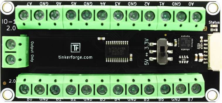 Breadboard with multiple green connectors and electrical components. Imprinted with 'tinkerforge.com'.