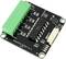 A black printed circuit board with green connectors, marked for inputs, and a large chip in the centre. Top left reads 'Input 36V'.