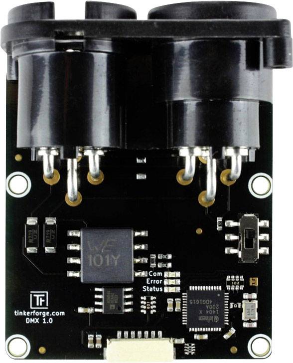 Electronic circuit board with multiple ports and visible circuit components, labelled with 'tinkerforge.com' and 'DMX 1.0'.