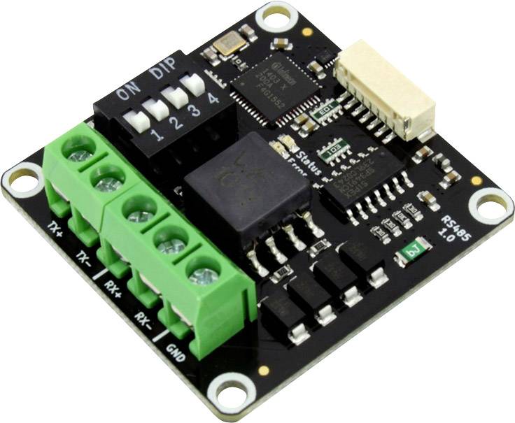 A small electronic circuit board with several green terminal blocks, DIP switches, and integrated circuits.
