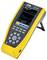 Portable testing device with a yellow casing and screen displaying current and voltage waveforms. Control buttons positioned underneath.