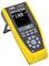 Portable digital measuring device with a yellow casing displays voltage of '2.042V' on its screen. It has a stand support and numerous operating buttons.