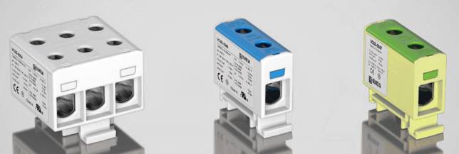 Three electrical terminal blocks in white, blue and yellow. Each terminal block has different insertion options and labels.