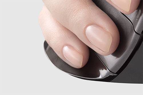 Close-up of a hand operating a computer mouse. The index finger is resting on the left mouse button.